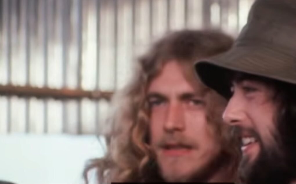 Robert Plant and Jimmy Page of Led Zeppelin prepare to take the stage at Bath, England, in 1970.